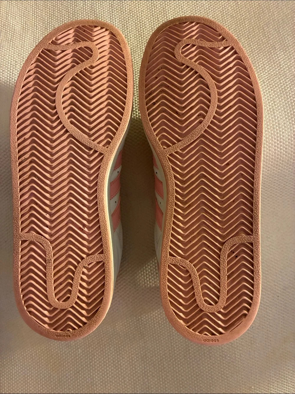 adidas Superstar White & Pink Women's Low-Top Sneakers & rubber shell toe.